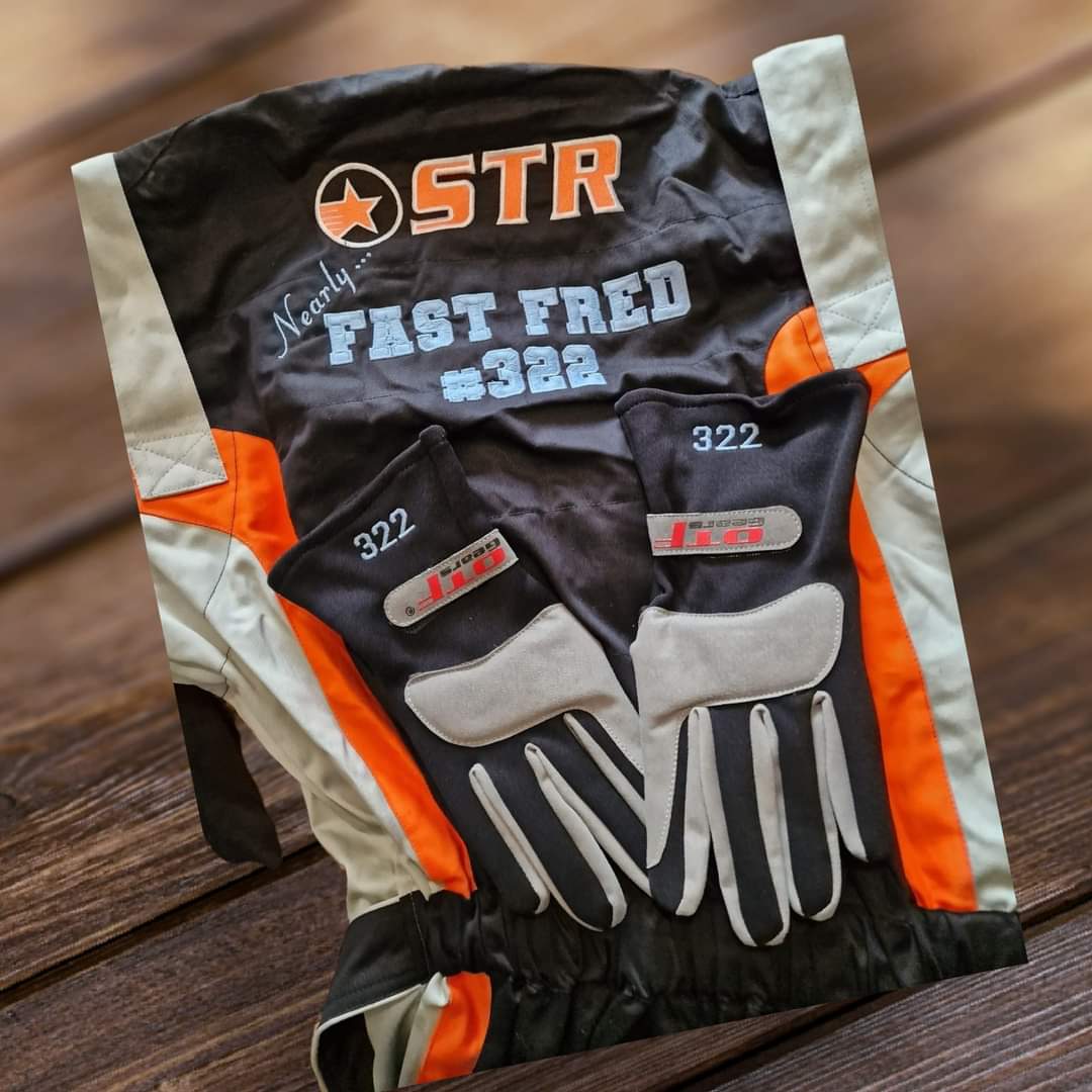 Team name embroidered onto overalls using Fire Fighter thread (overalls not supplied)