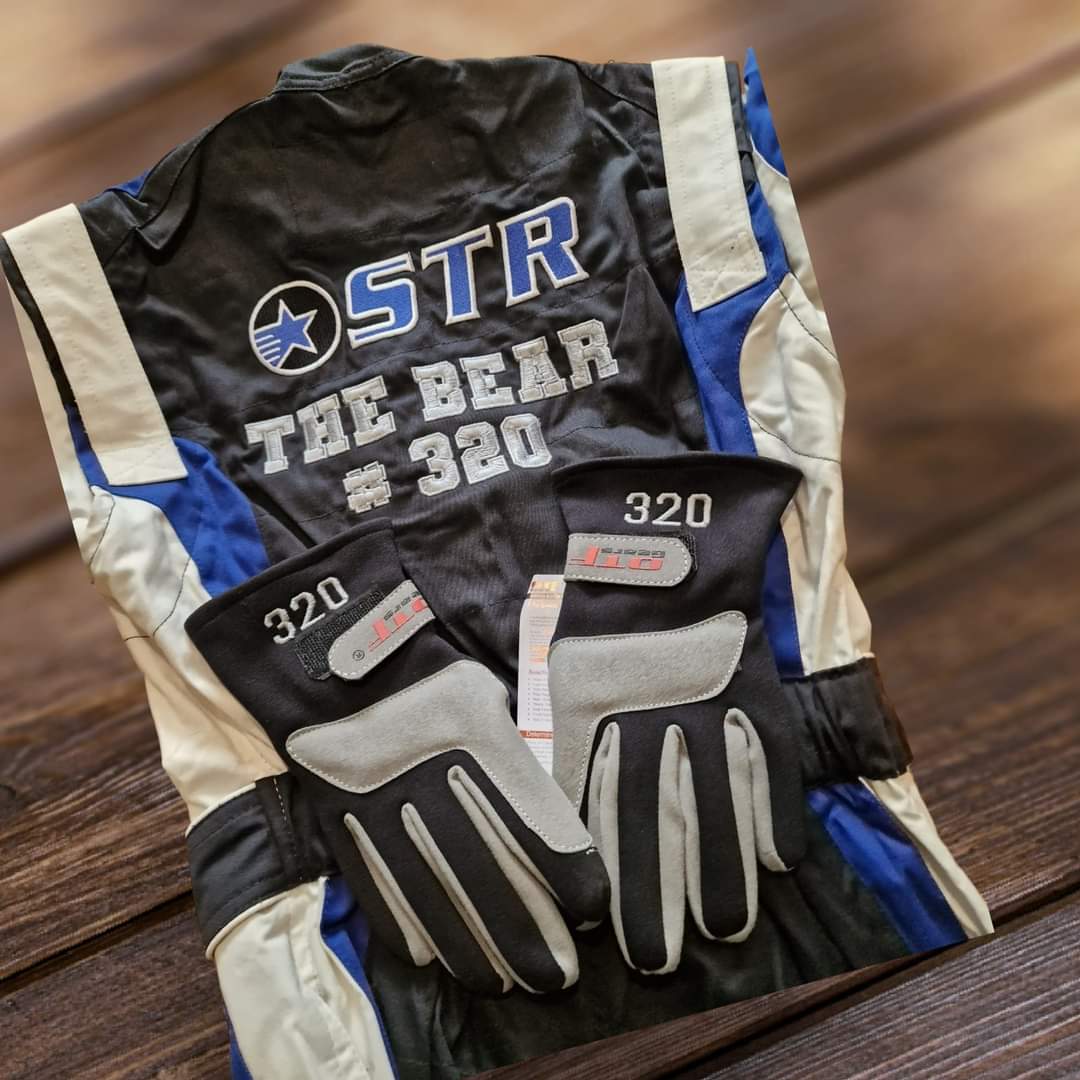 Team name embroidered onto overalls using Fire Fighter thread (overalls not supplied)